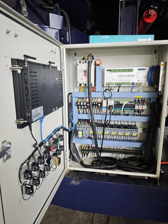 Open batching control cabinet with weighing controller, electrical terminals and wiring