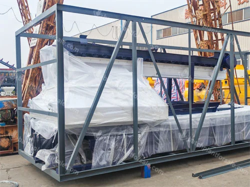Batching equipment module secured inside a steel transport crate